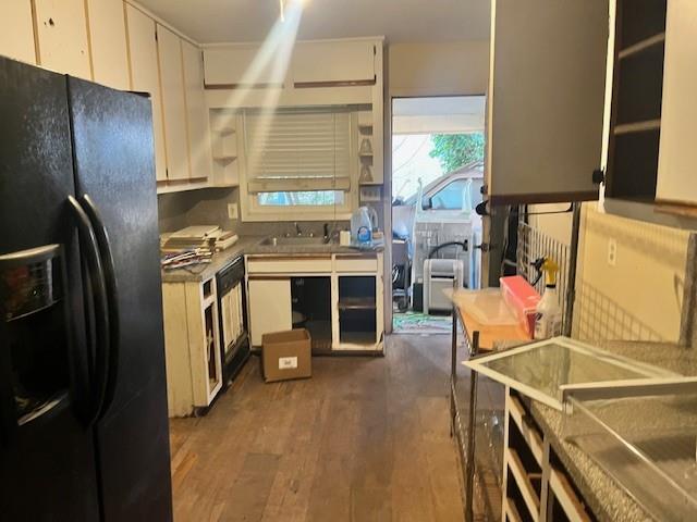 3833 Leander Court Tucker, GA 30084 - Photo 7 of 29 a kitchen with stainless steel appliances granite countertop a refrigerator a stove and a sink with wooden floor