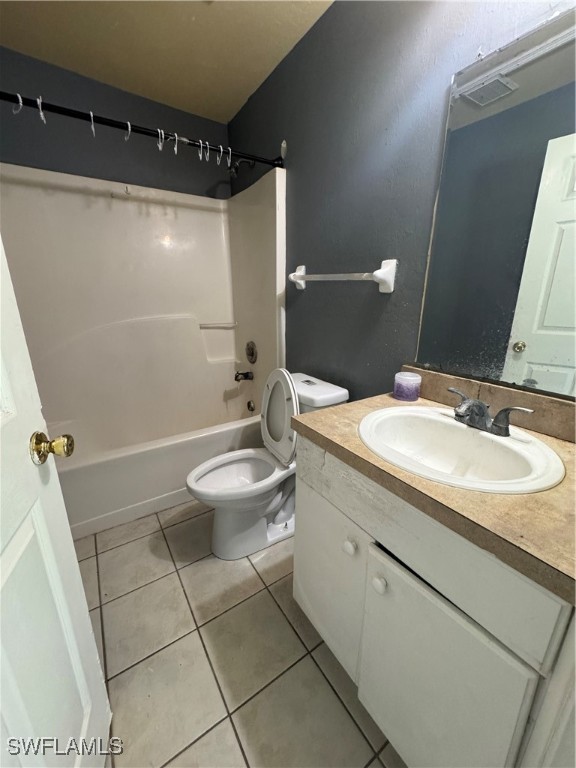 4541 21st Street Southwest Lehigh Acres, FL 33973 - Photo 12 of 15 a bathroom with a sink toilet and shower