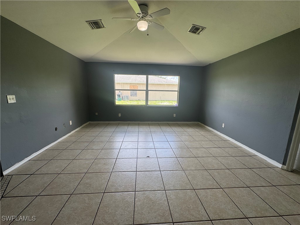 4541 21st Street Southwest Lehigh Acres, FL 33973 - Photo 4 of 15 a view of an empty room with a window