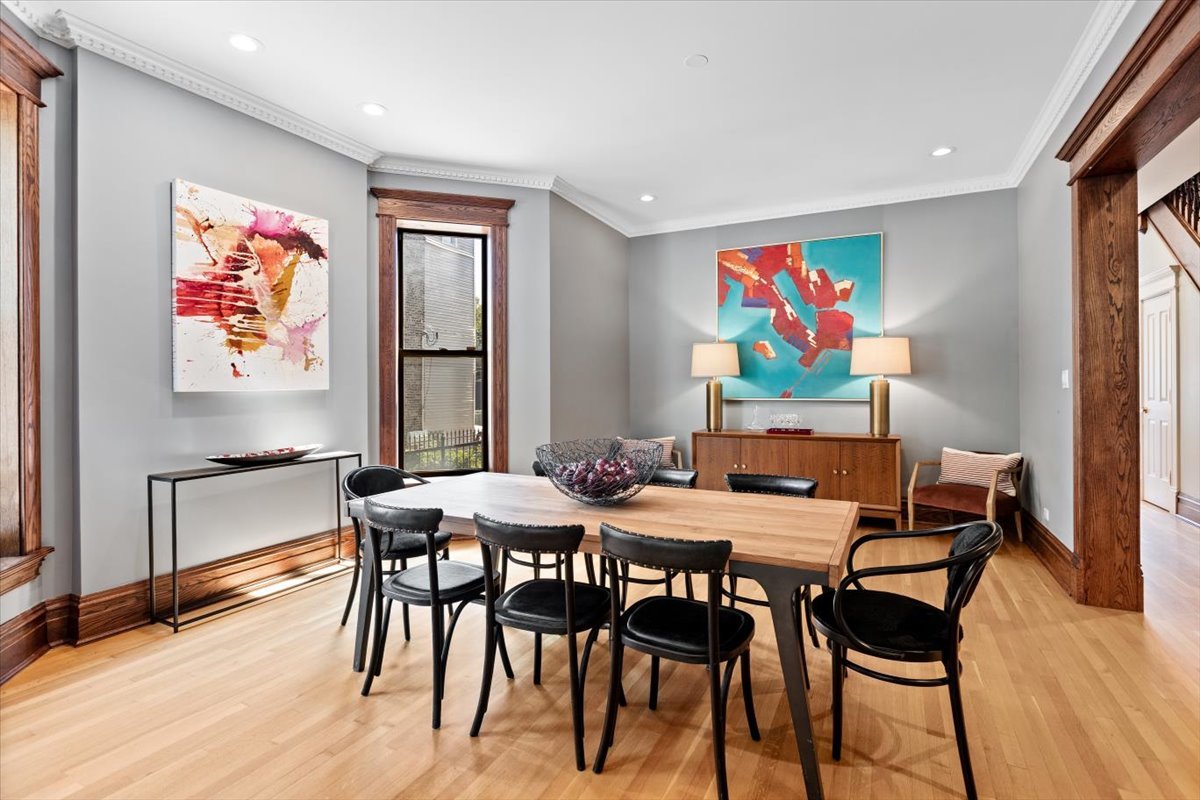 2845 West Division Street Chicago, IL 60622 - Photo 7 of 49 a view of a dining room with furniture and wooden floor