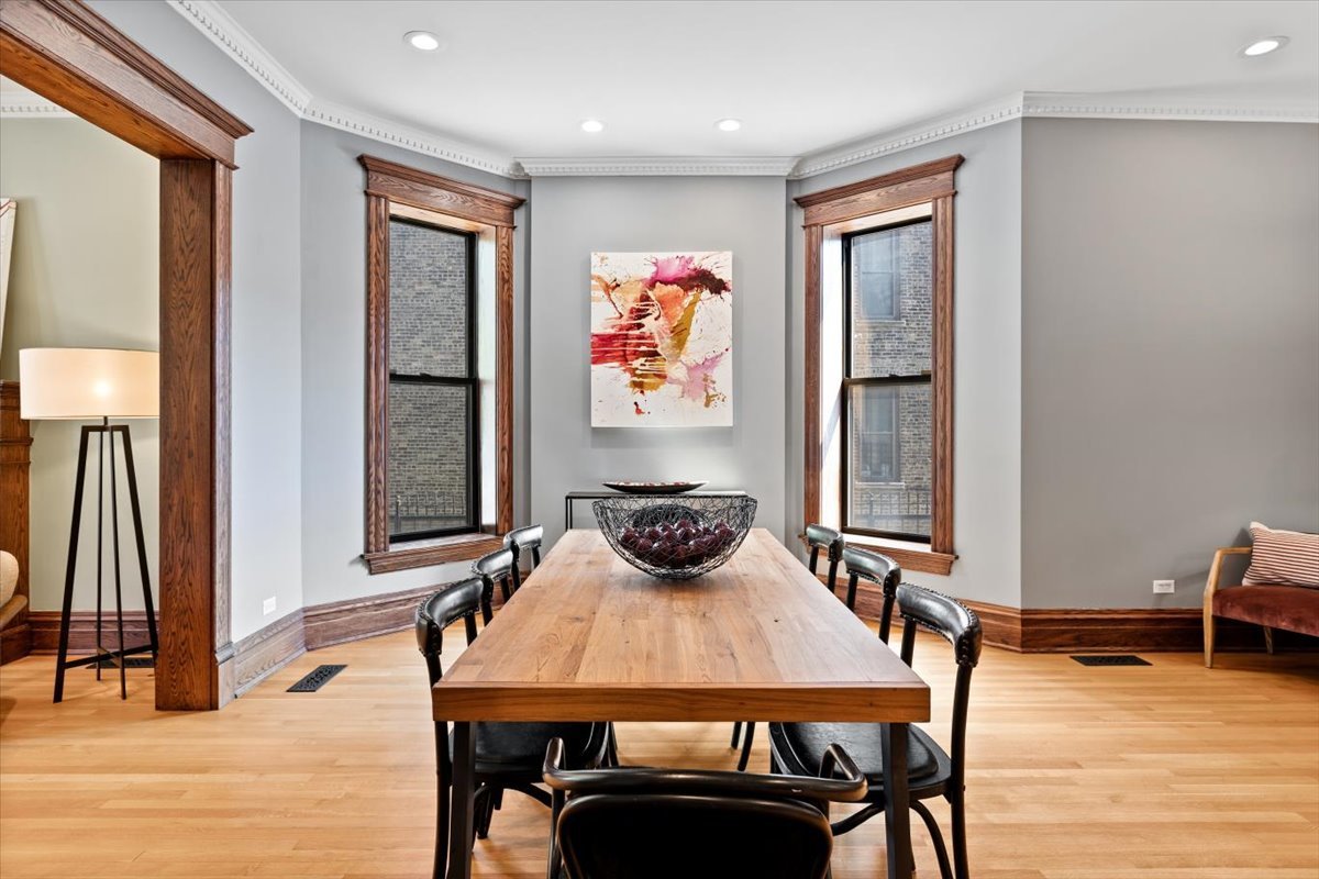 2845 West Division Street Chicago, IL 60622 - Photo 8 of 49 a view of a dining room with furniture window and wooden floor