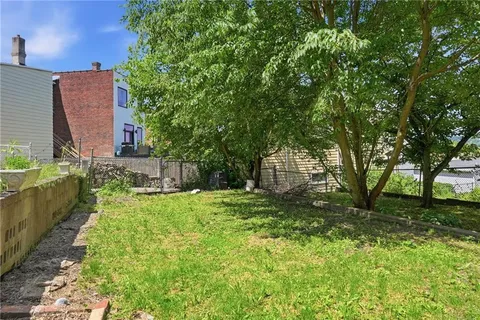 a garden view with a seating space