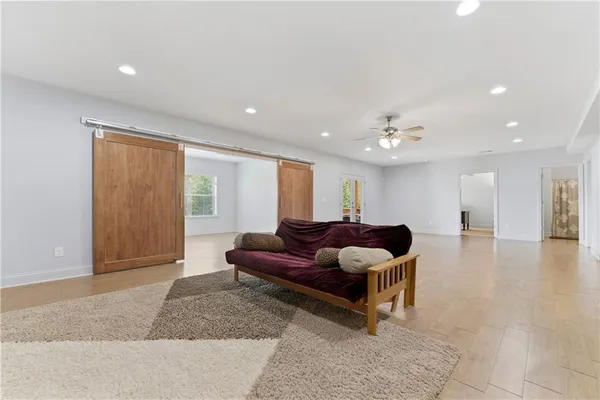 an aerial view of a house with swimming pool and outdoor space