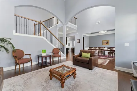 a living room with furniture and a table