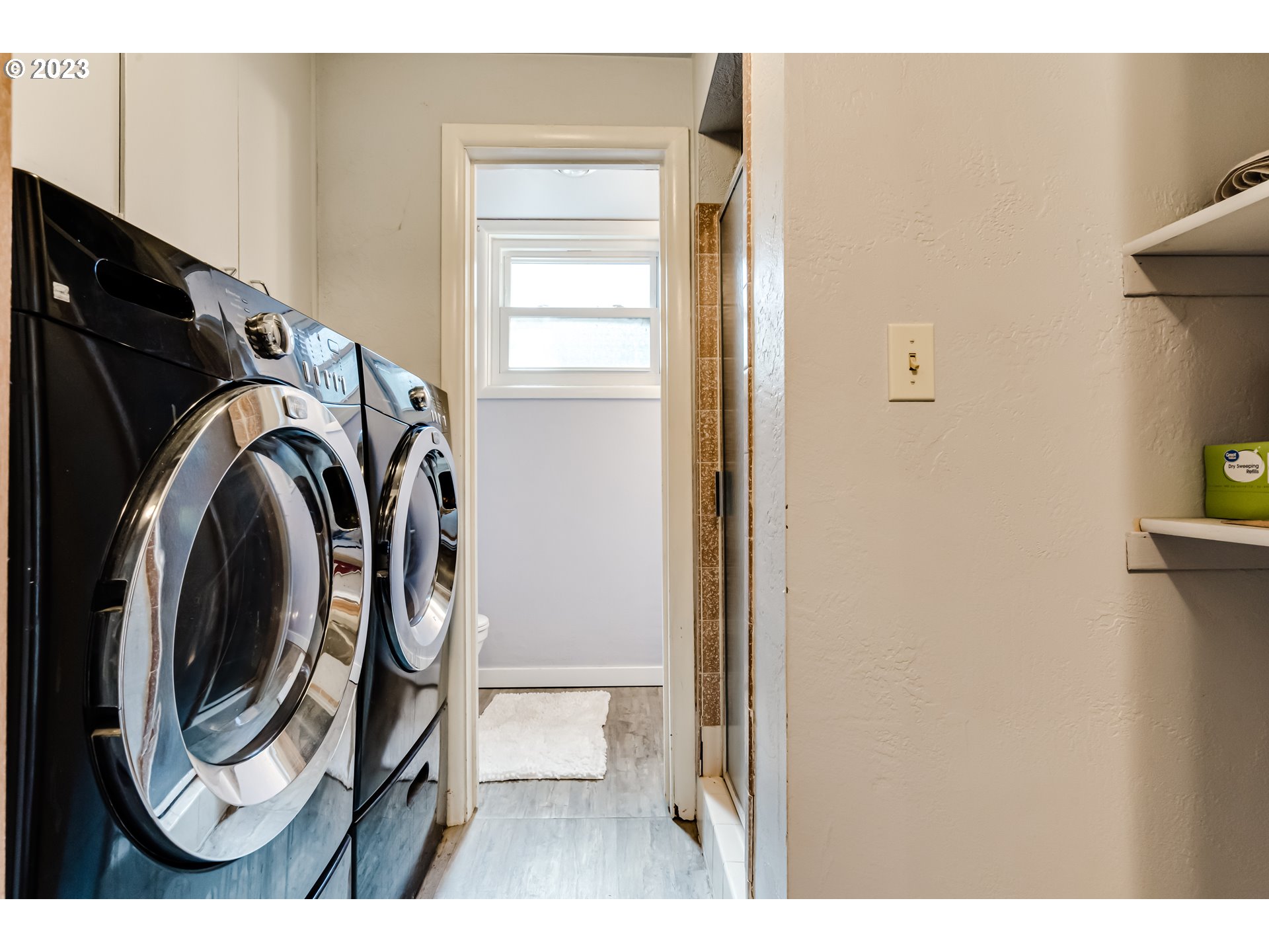 460 South 4th Street Springfield, OR 97477 - Photo 26 of 32 a view of storage and utility room with washer and dryer
