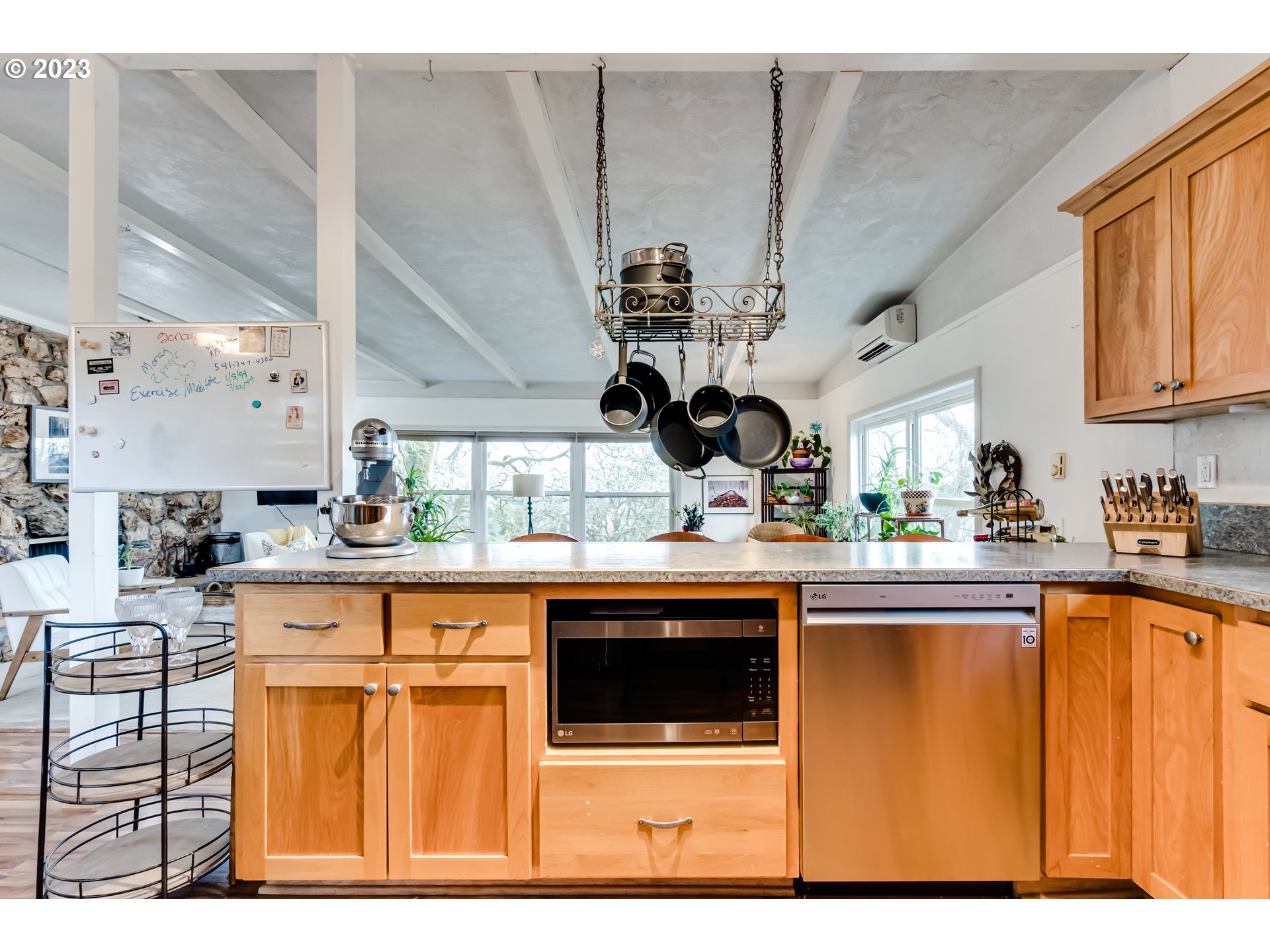 460 South 4th Street Springfield, OR 97477 - Photo 6 of 32 a kitchen with stainless steel appliances granite countertop a sink and cabinets