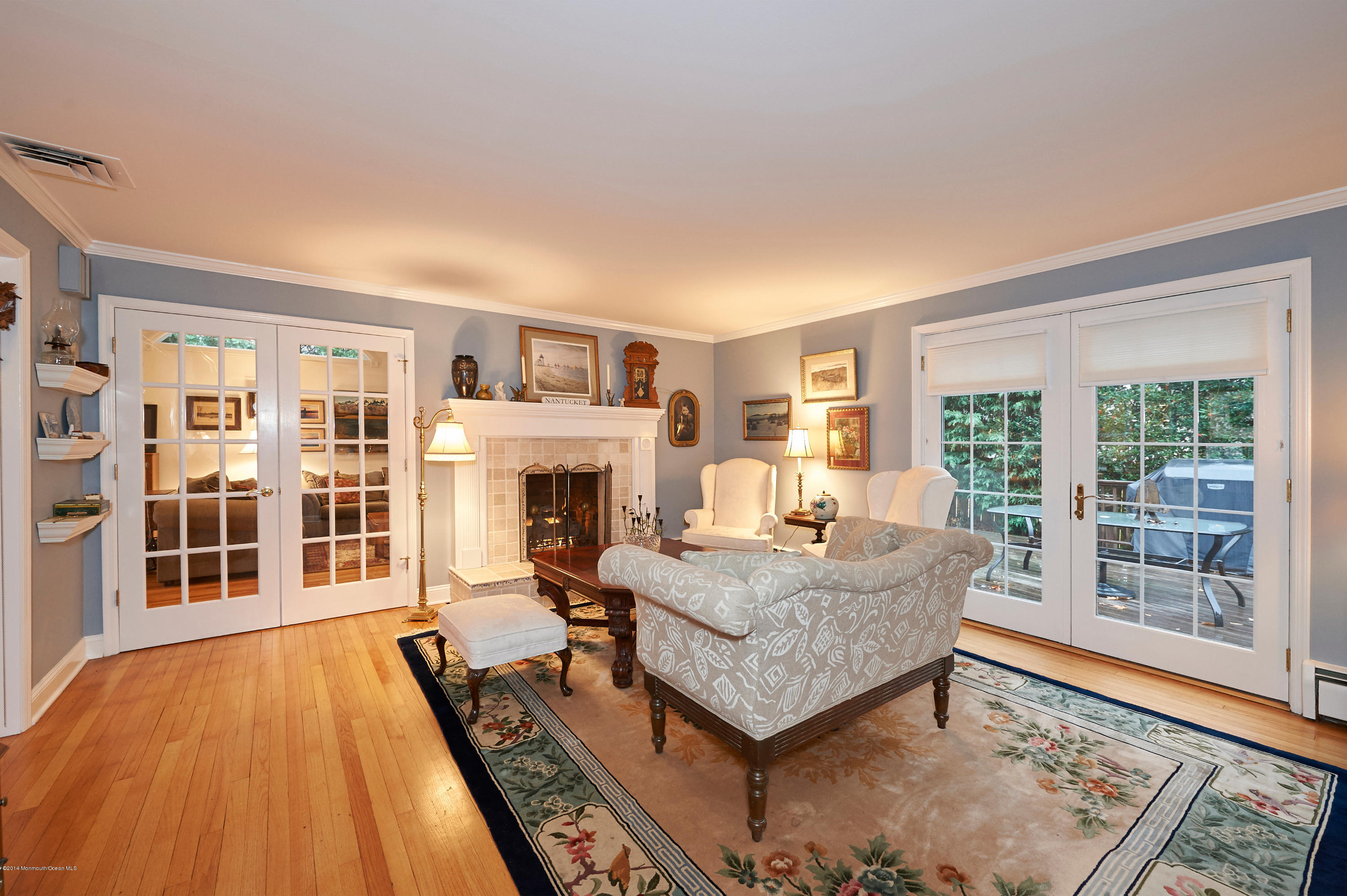 52 Ave Of Two Rivers Rumson, NJ 07760 - Photo 9 of 20 Living room featuring fireplace