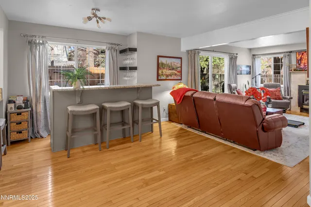 a kitchen with stainless steel appliances a refrigerator and a stove top oven