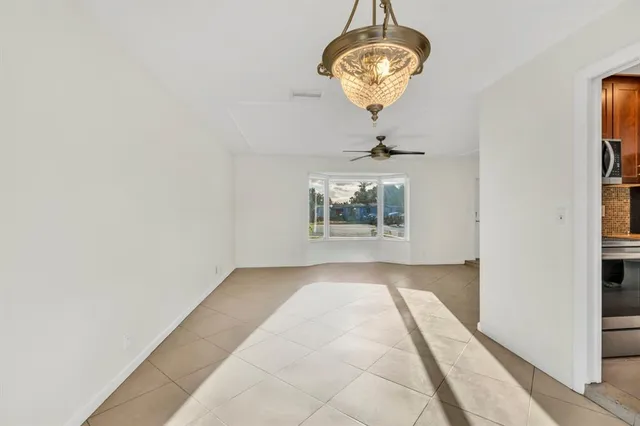 a bathroom with a toilet sink and shower
