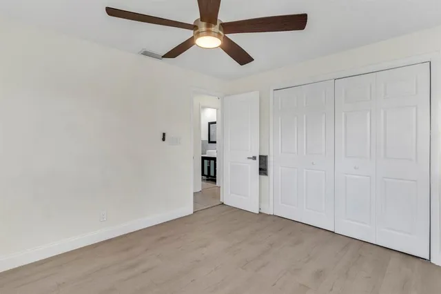 a view of a living room and chandelier