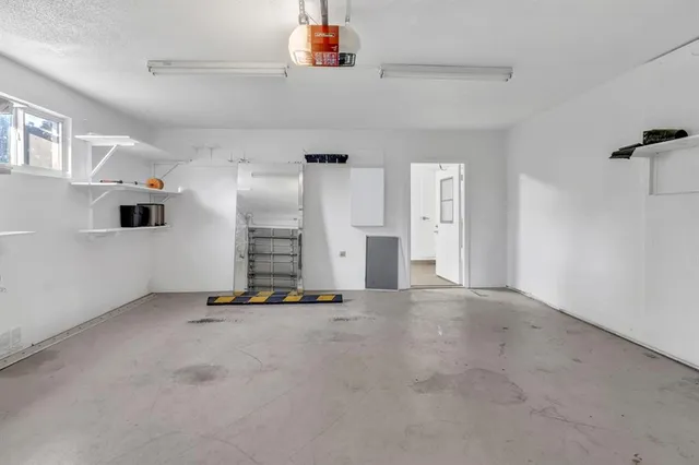 an aerial view of house with yard swimming pool and outdoor seating
