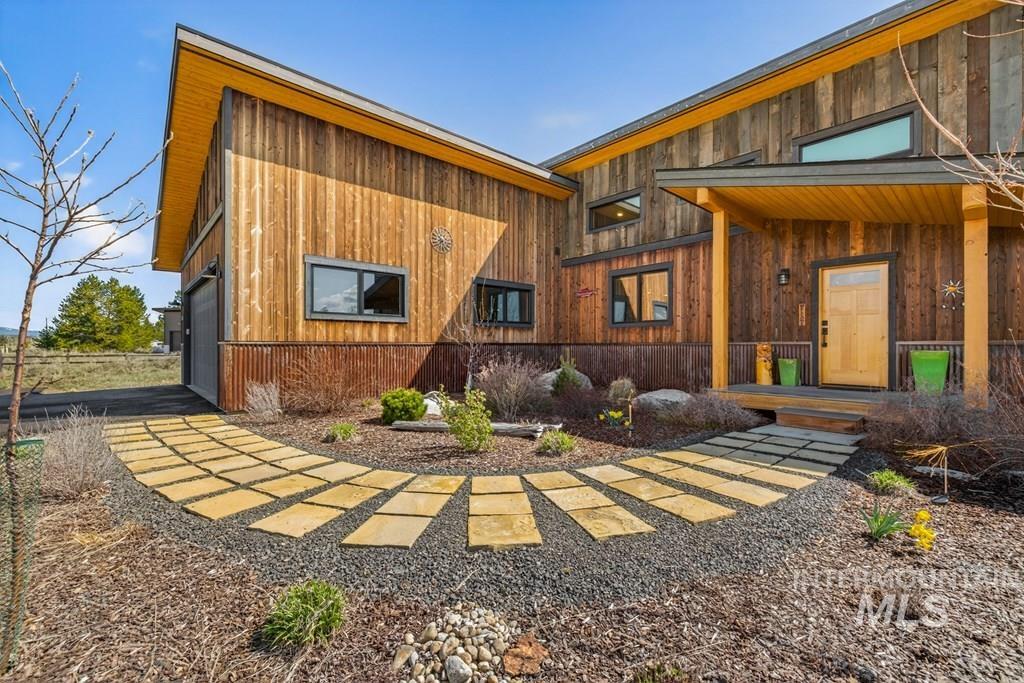 13800 Raptor Loop McCall, ID 83638 - Photo 21 of 34 Contemporary-style exterior featuring natural wood siding and a covered entry
