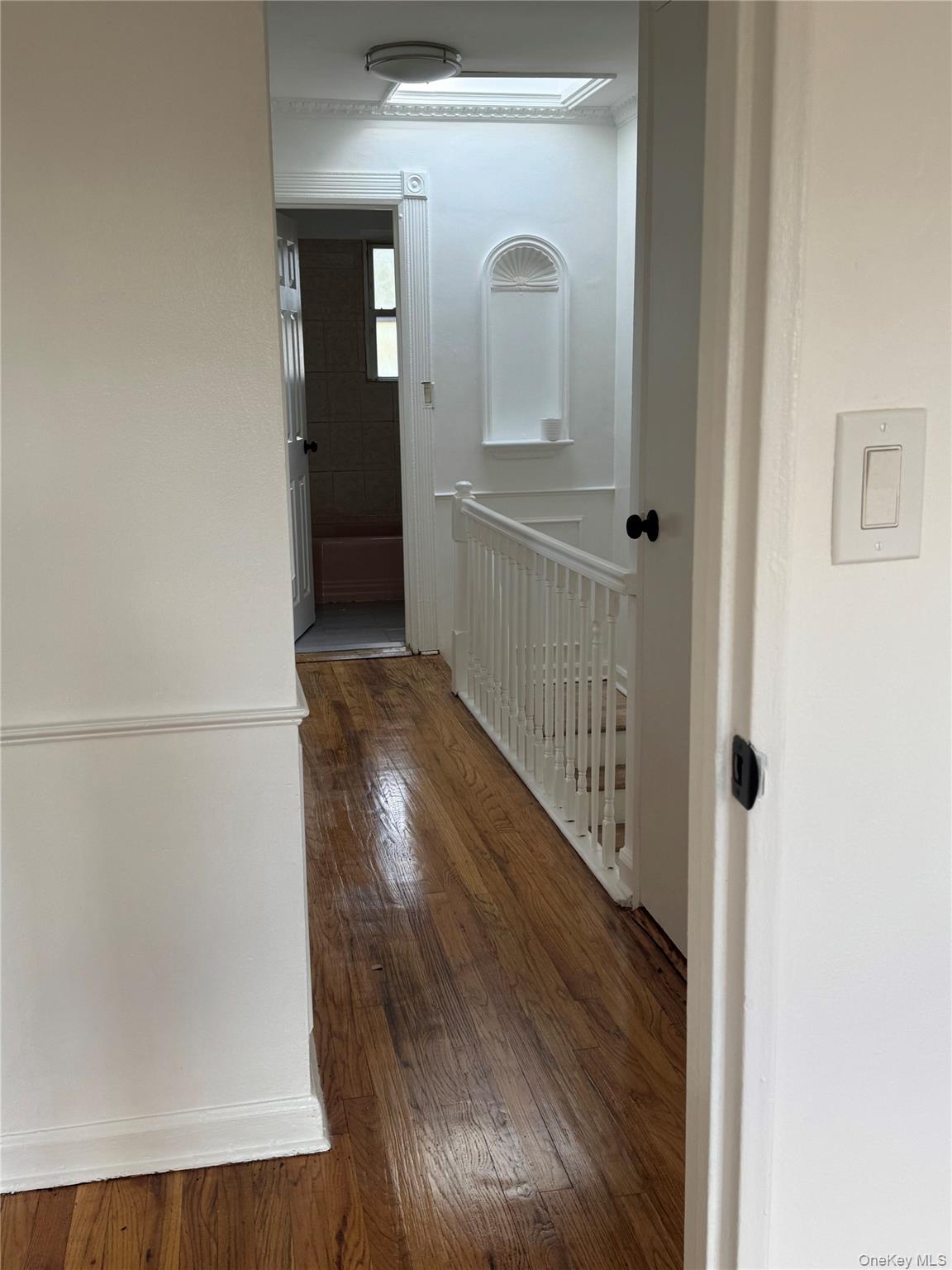 1574 Paulding Avenue, Unit 2 Bronx, NY 10462 - Photo 11 of 25 a view of a hallway view with wooden floor