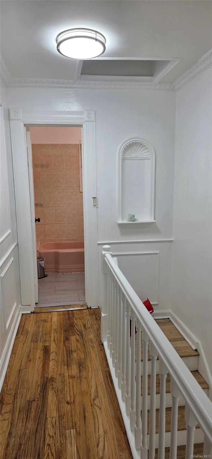 1574 Paulding Avenue, Unit 2 Bronx, NY 10462 - Photo 6 of 25 a view of hallway with wooden floor