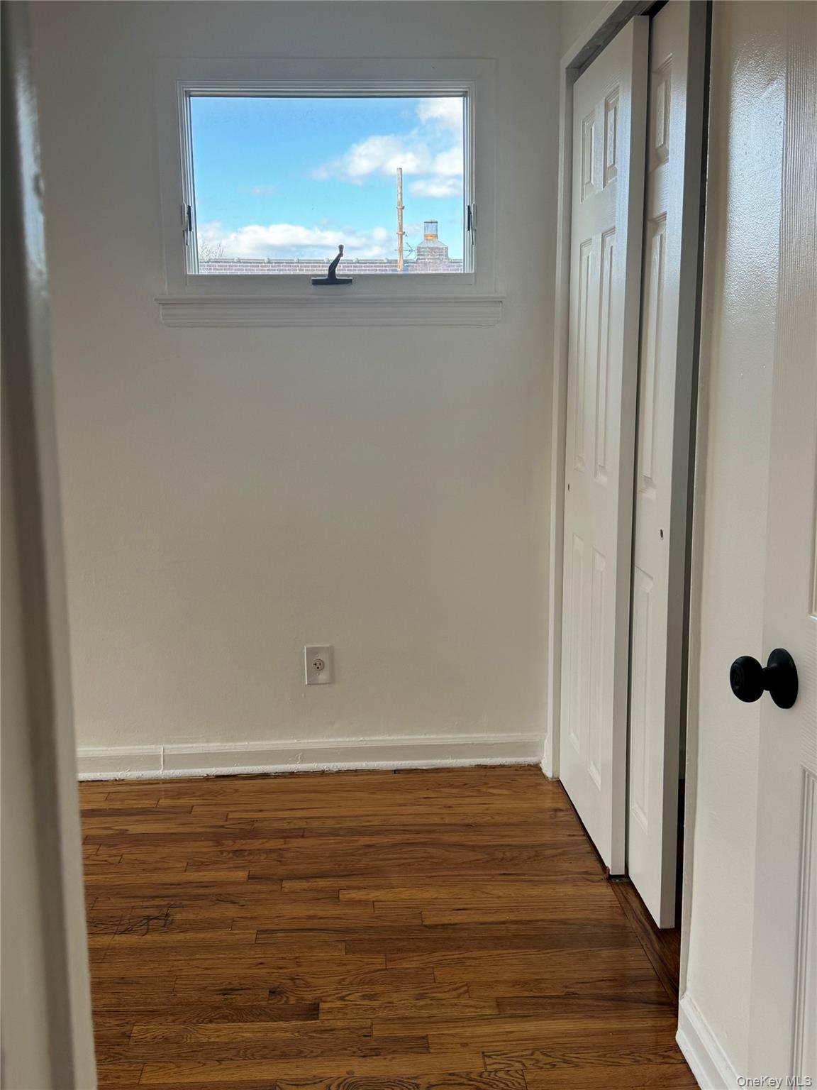 1574 Paulding Avenue, Unit 2 Bronx, NY 10462 - Photo 10 of 25 a view of a closet area with wooden floor