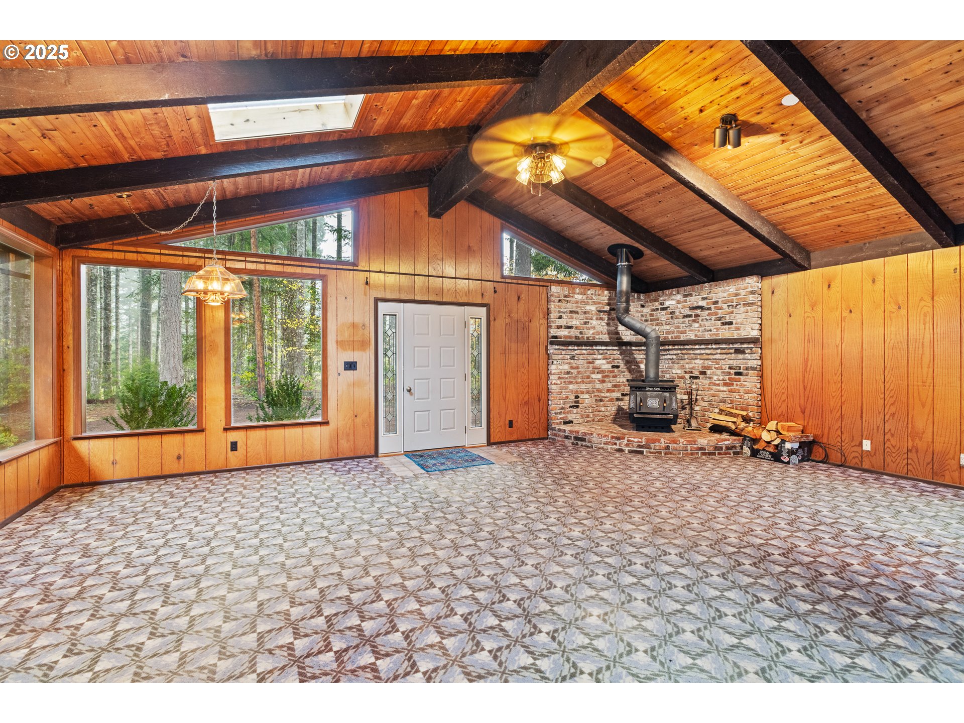 57247 Fairview Road Coquille, OR 97423 - Photo 12 of 45 a window and a table and chair in the back yard