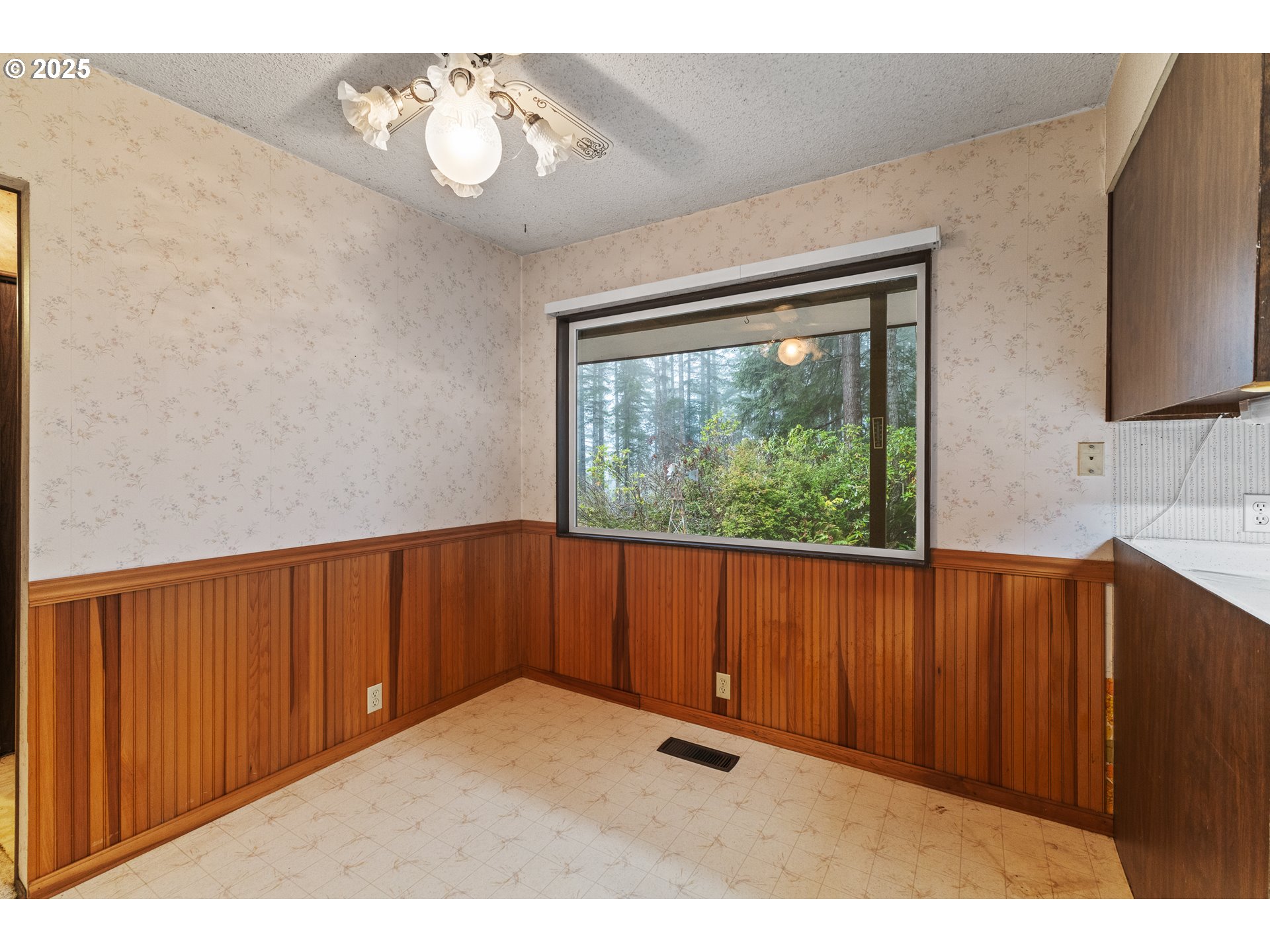 57247 Fairview Road Coquille, OR 97423 - Photo 19 of 45 a view of an empty room with a window