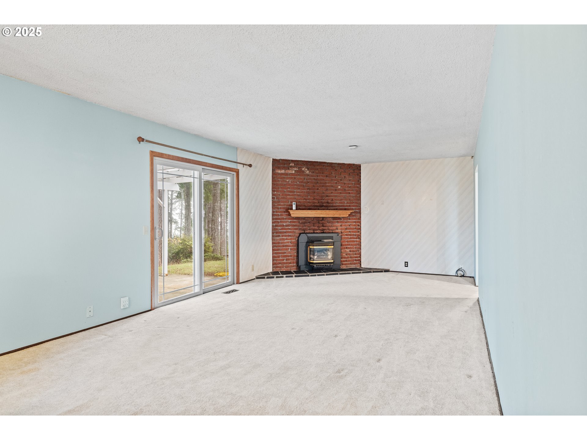 57247 Fairview Road Coquille, OR 97423 - Photo 22 of 45 a view of an empty room with a window