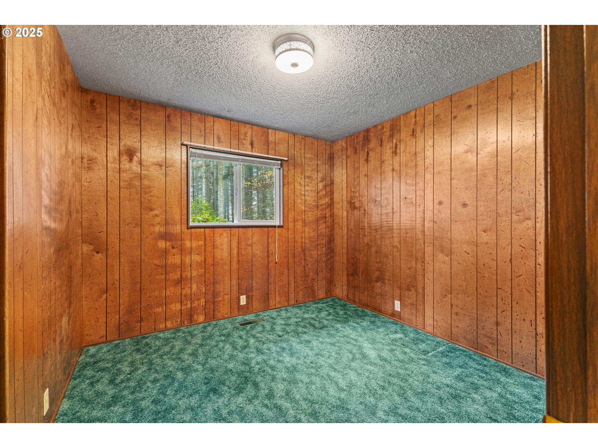 57247 Fairview Road Coquille, OR 97423 - Photo 28 of 45 a view of an empty room with a window
