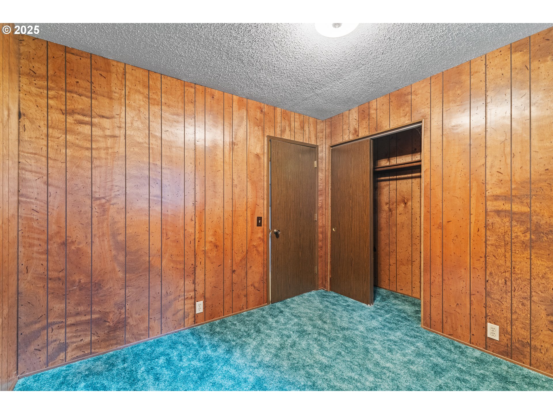 57247 Fairview Road Coquille, OR 97423 - Photo 29 of 45 a view of an empty room with wooden walls