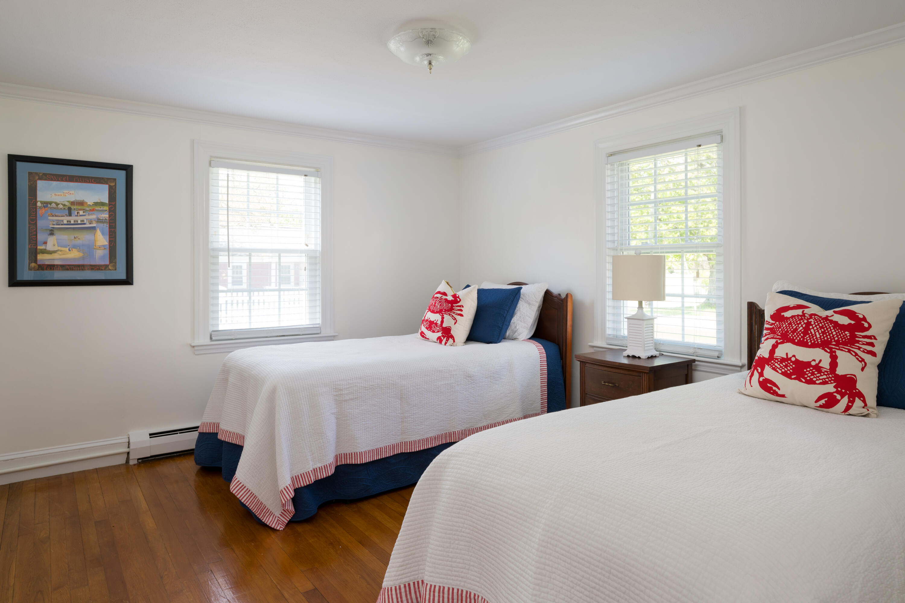 111 Lewis Road West Yarmouth, MA 02673 - Photo 19 of 43 a bedroom with two beds and a window