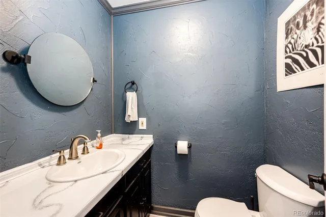 a view of a balcony with dining table and chairs with wooden floor