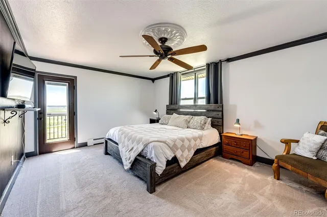 a aerial view of a house with a ocean view