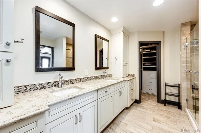 a view of a house with a snow in the background