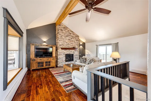 a view of a livingroom with furniture and furniture