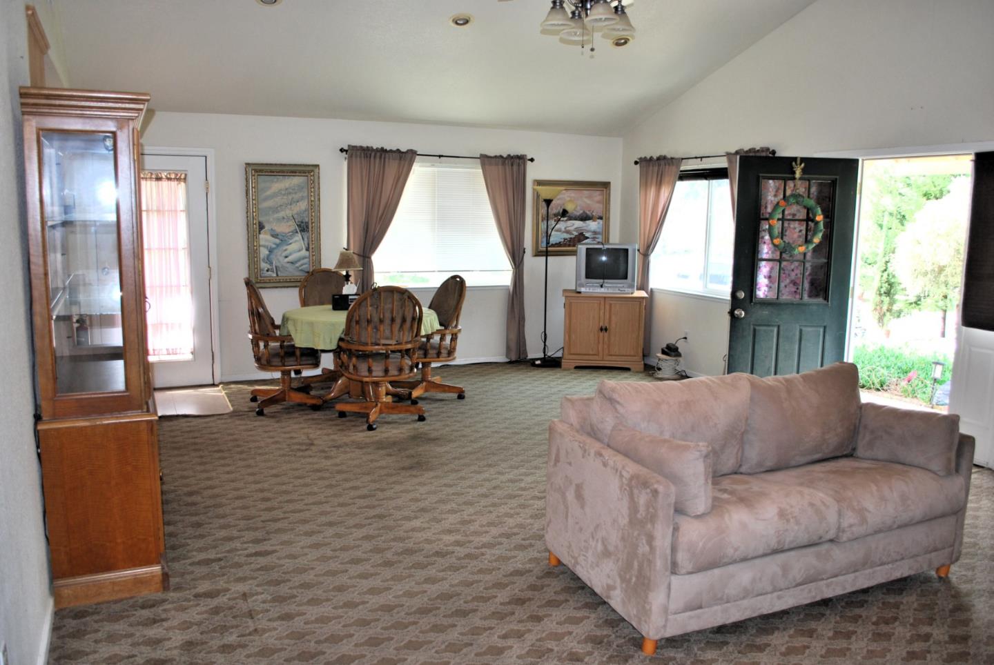 9194 Coker Road Salinas, CA 93907 - Photo 15 of 27 a living room with furniture and a large window