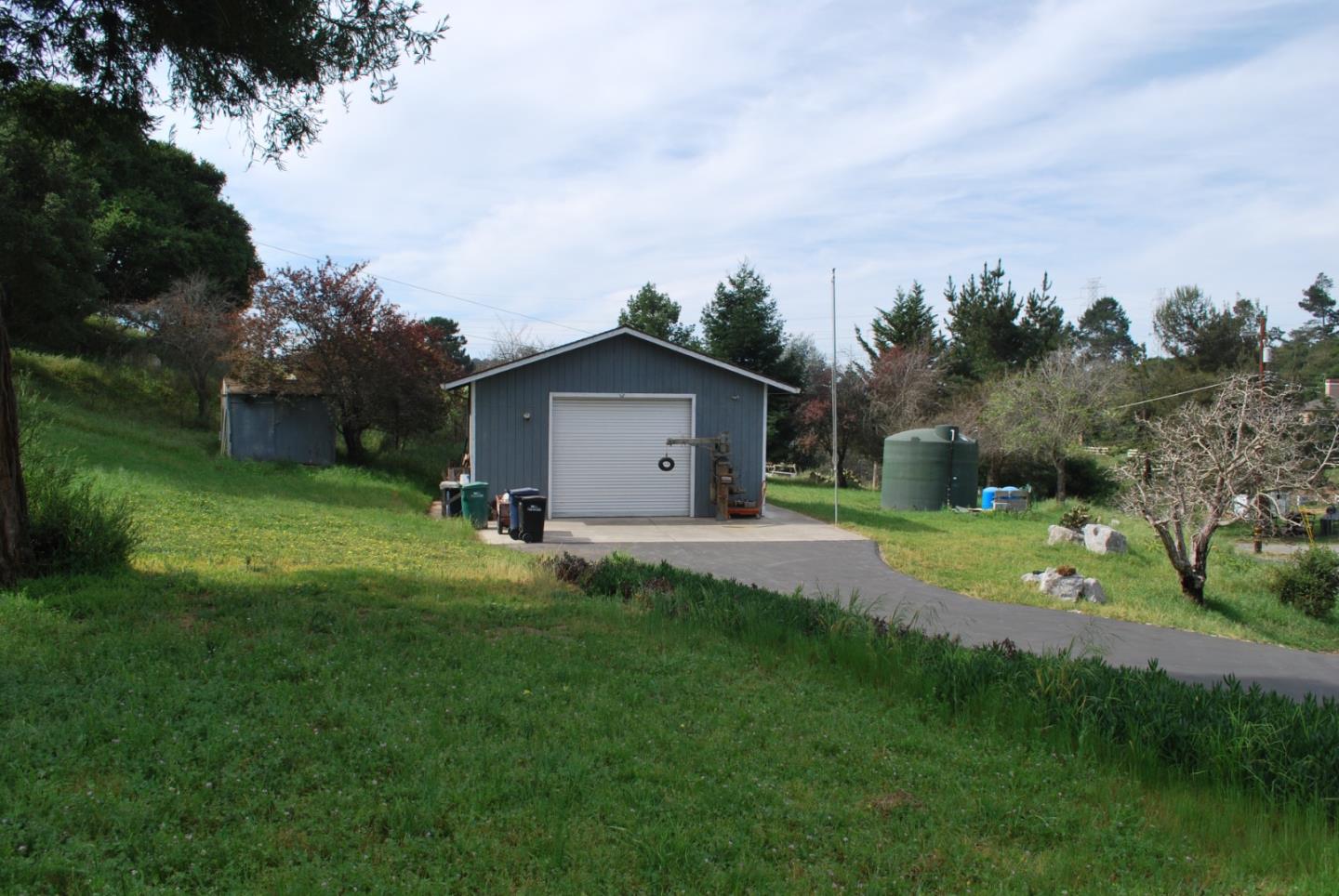 9194 Coker Road Salinas, CA 93907 - Photo 17 of 27 a view of a house with backyard and garden