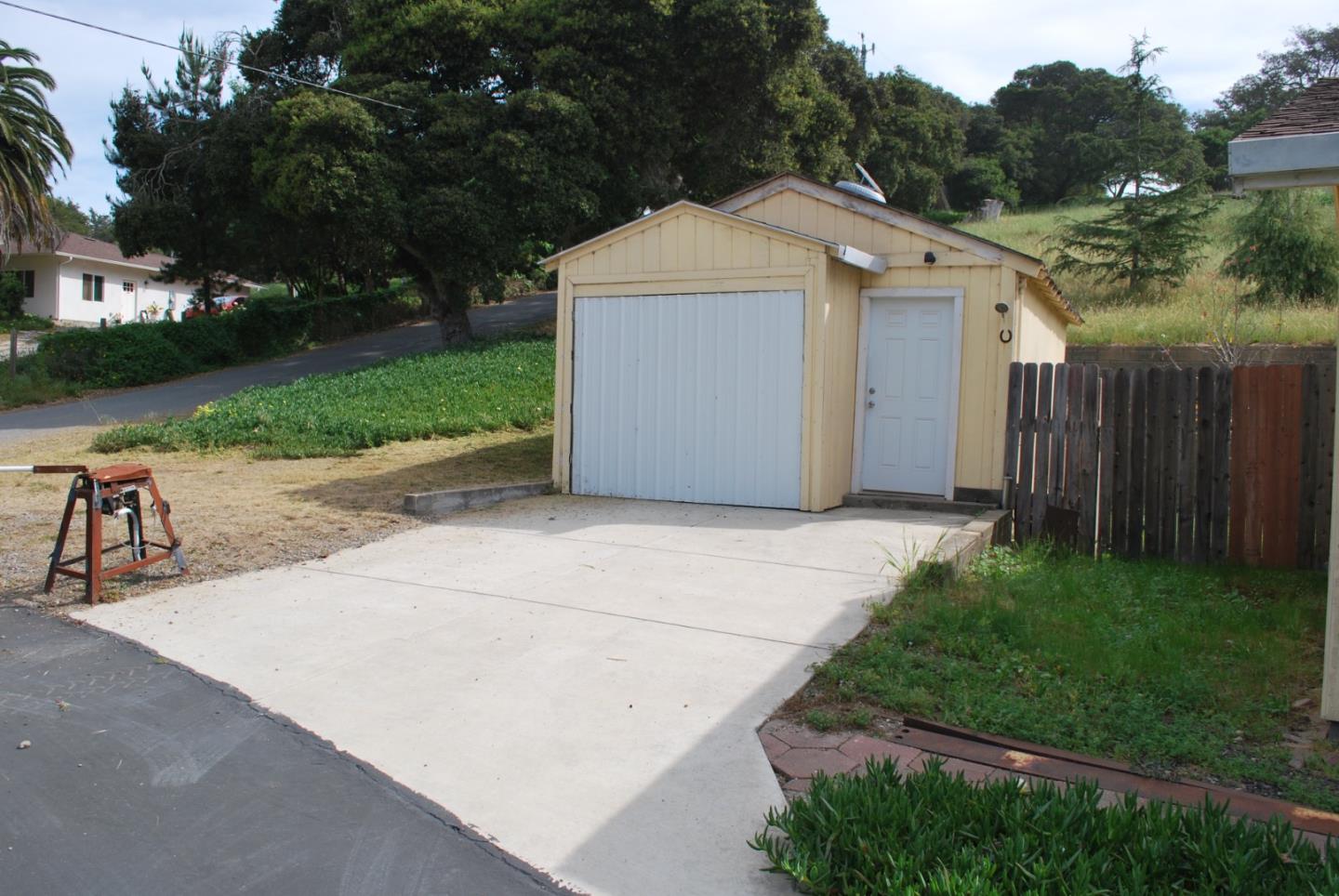 9194 Coker Road Salinas, CA 93907 - Photo 24 of 27 a aerial view of a house with a yard and garage