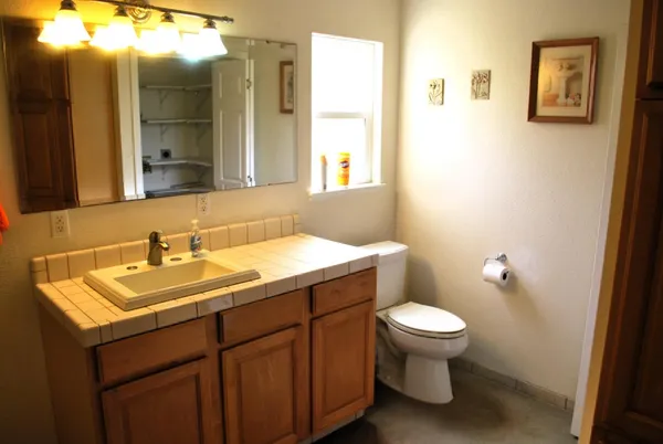 a bathroom with a sink and a toilet