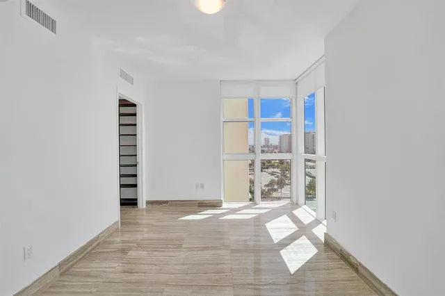 a bathroom with a shower and a toilet