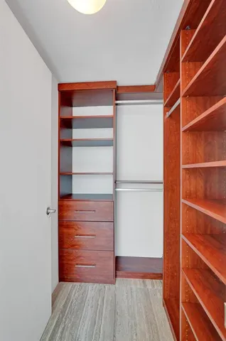 a swimming pool with outdoor seating and yard