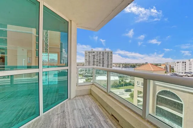a view of gym equipment with kitchen view