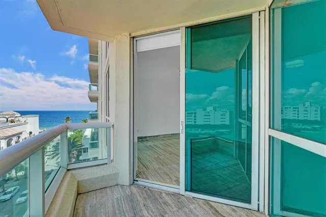 a bedroom with a bed and a chair