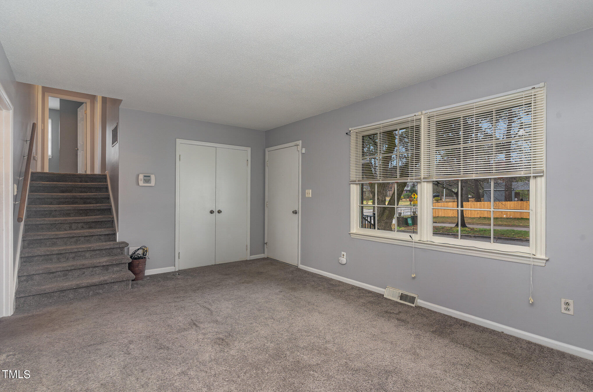4100 Kilcullen Drive Raleigh, NC 27604 - Photo 7 of 19 an empty room with windows