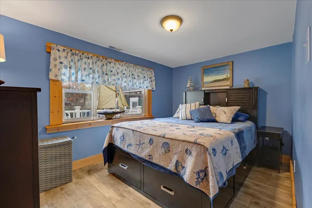 a white toilet sitting next to a bathroom sink