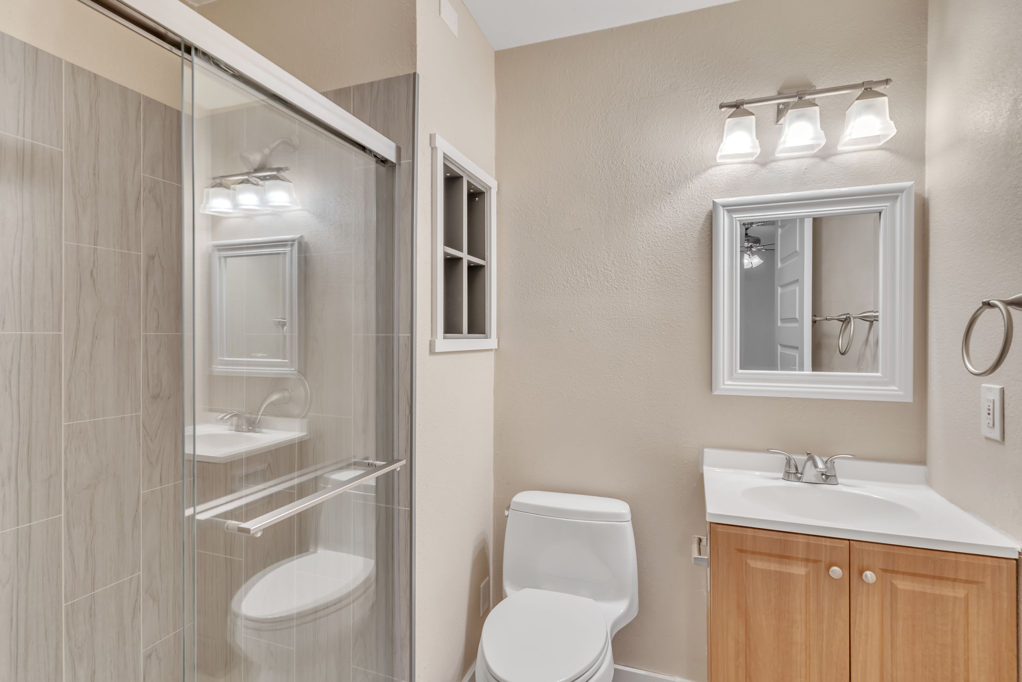 3214 Clawson Road, Unit A Austin, TX 78704 - Photo 14 of 26 A well-appointed bathroom offers both a spacious shower and a convenient vanity.