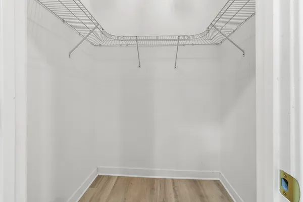 a view of a room with racks on the wall