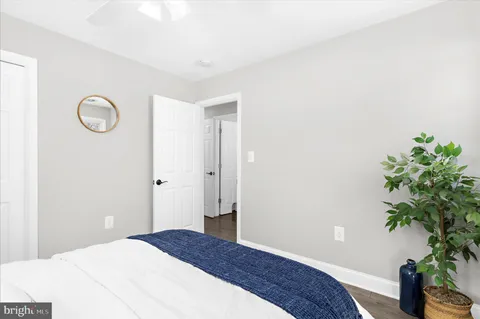 a bed room with a bed and a window