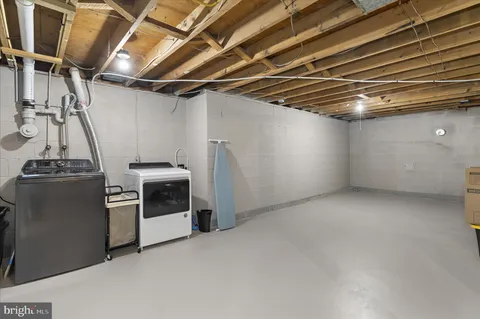 an empty room with closet area