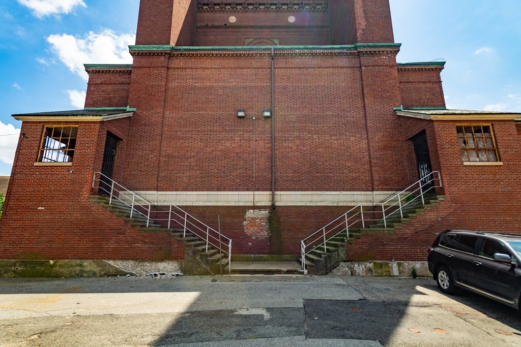 361 Centre Street Boston, MA 02130 - Photo 5 of 9 a car parked in front of a house