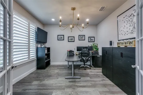 a view of a livingroom with furniture and window