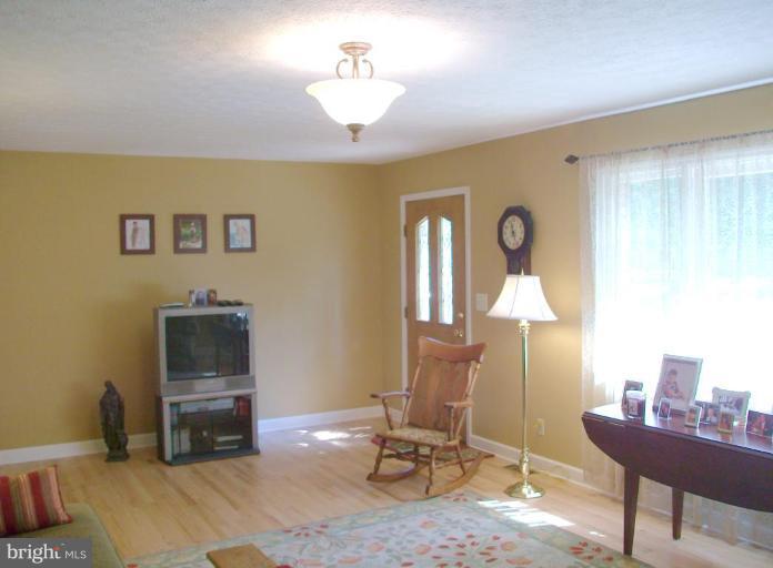 572 Murphy Road Berkeley Springs, WV 25411 - Photo 3 of 30 Living Room #2
