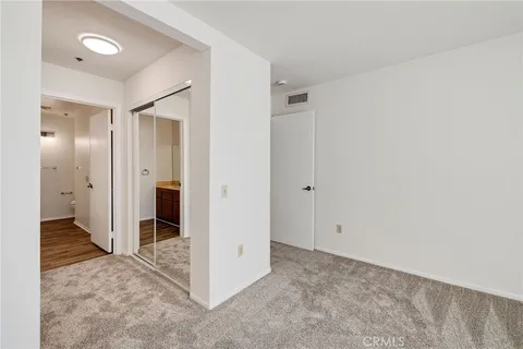 a view of entryway with bathroom