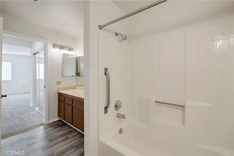 an empty room with a mirror