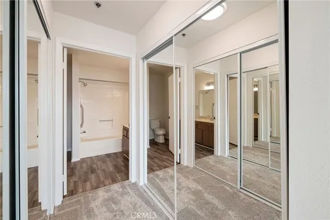 a bathroom with a double vanity sink mirror and