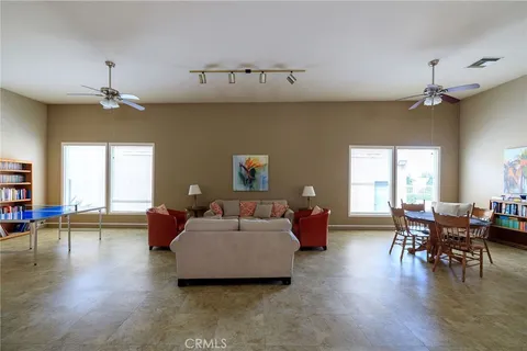 a view of parking garage with cars parked